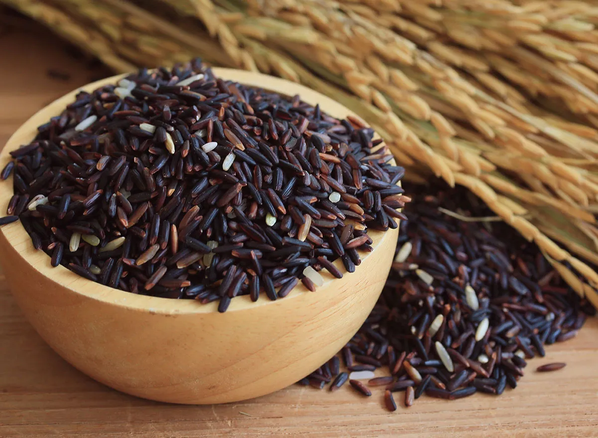 black nunia rice in bowl - - Kalonunia Rice Receives Prestigious GI Tag
